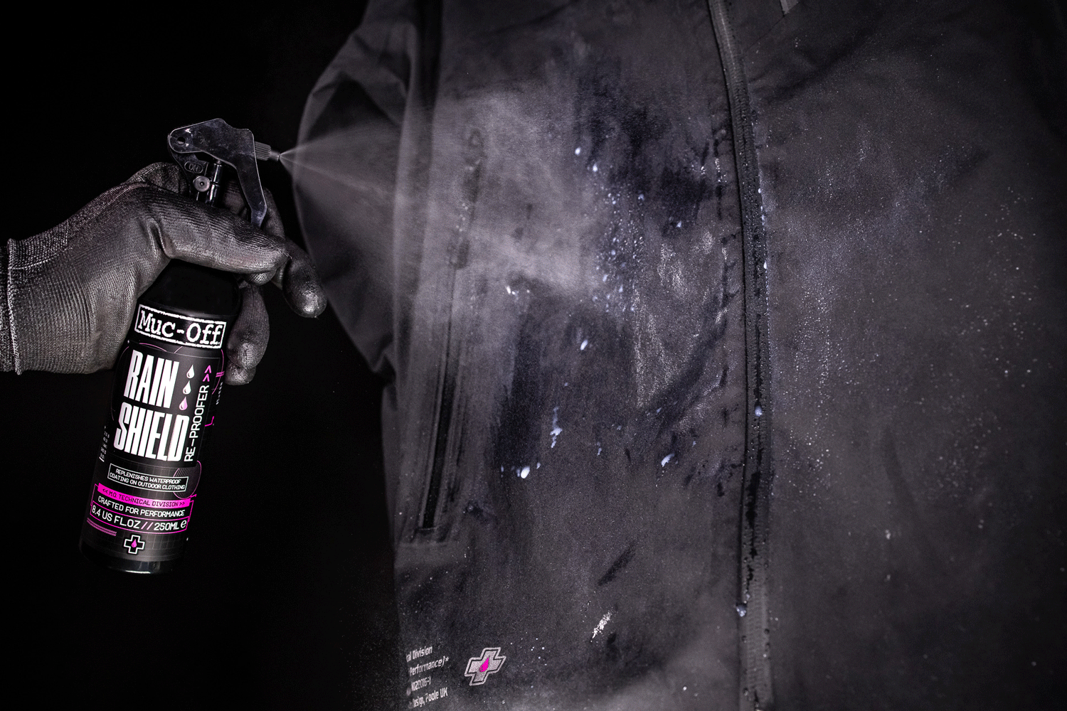 Rain Shield Re-Proofer on Black Riders Jacket.gif