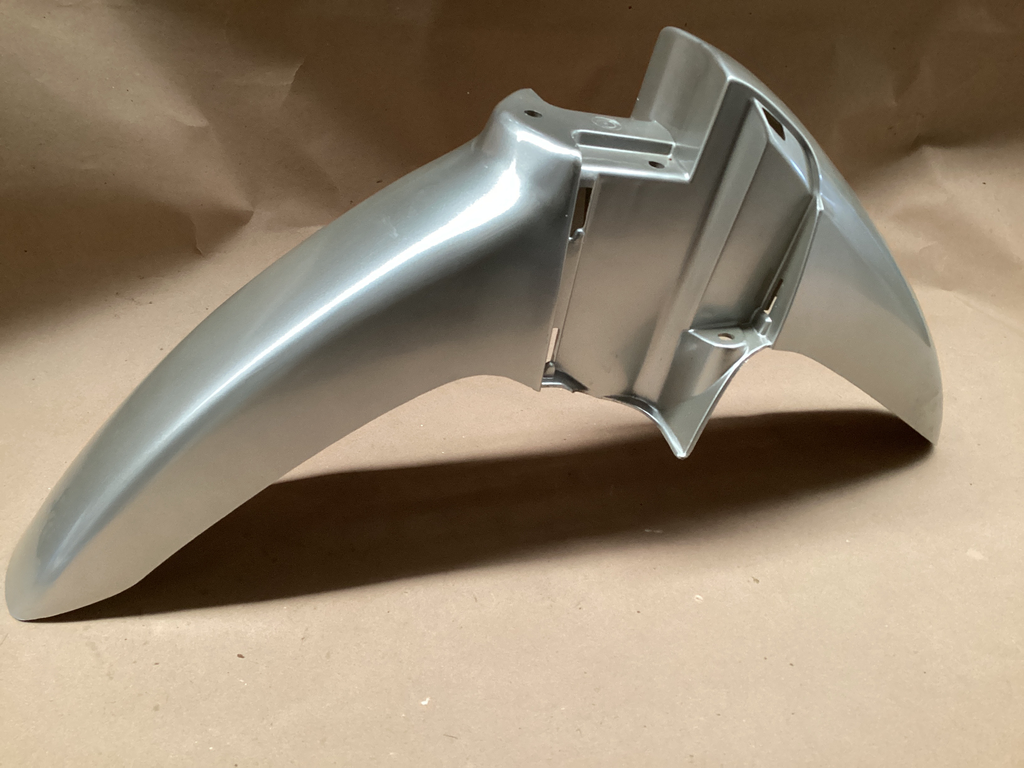 SALPICADERA DELANTERA BIZ + PLATA MET. 05