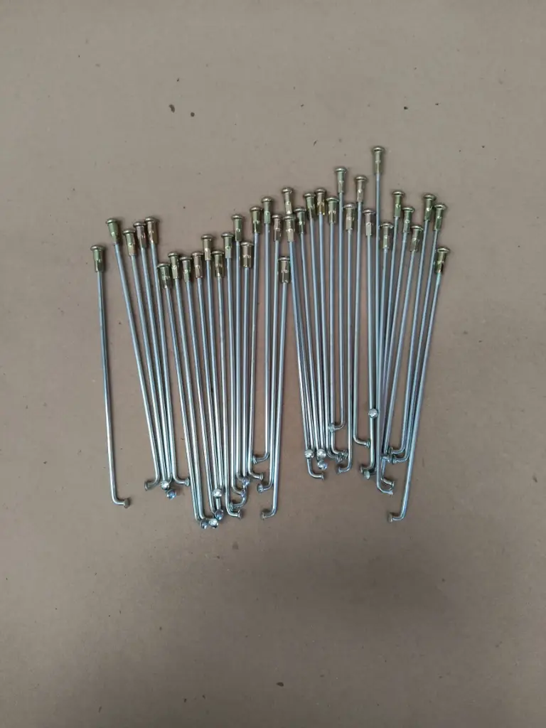 SET RAYO CON NIPLE DELANTERO/TRASERO YH YBR/HN CARGO 164MM (36 PZ)